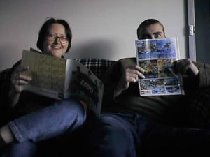 Sue Ann Barber and Paul Baulch looking at old LEGO catalogues at the first MUGs meeting, October 8th, 2000. Photo by Ross Crawford